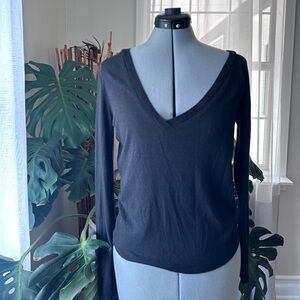 Maison Martin Margiela black jumper with sideways pulled neckline — fall 2007